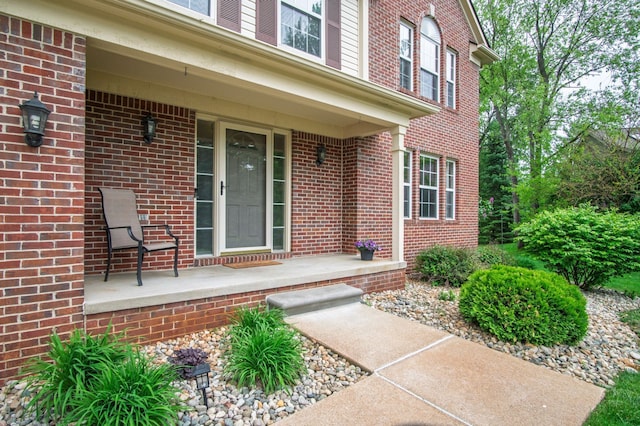 8313 Mill Pointe Ct, Goodrich, MI 48438 - entrance to property featuring a porch and brick siding