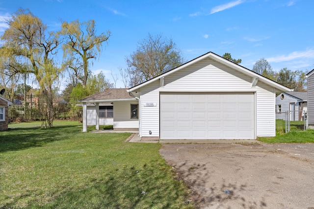 single story home featuring driveway and a front lawn