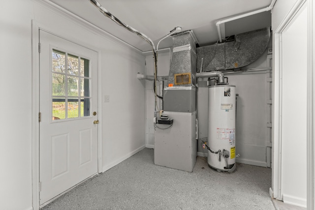 utility room featuring heating unit and water heater