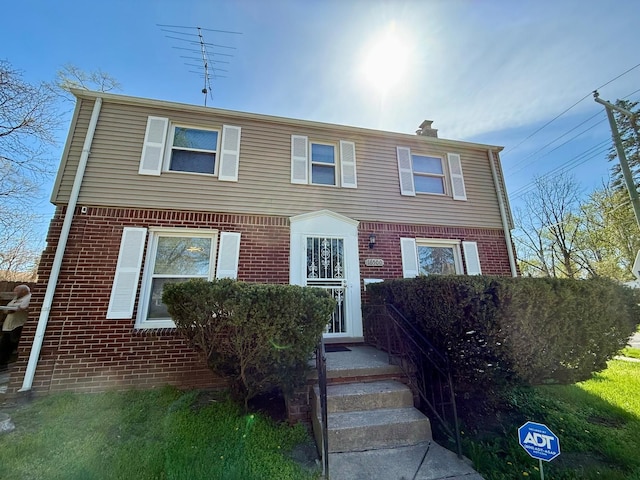 view of front of property with brick siding