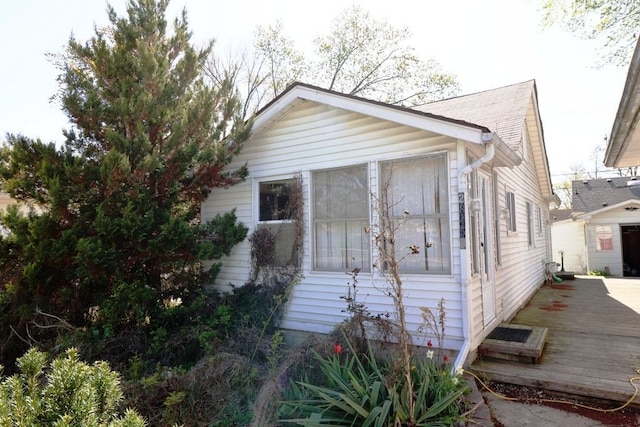 view of home's exterior with a deck