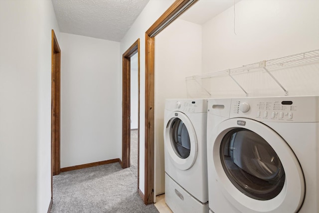 7996 Cain Rd, Jackson, MI 49201 - washroom featuring baseboards, separate washer and dryer, laundry area, and light colored carpet