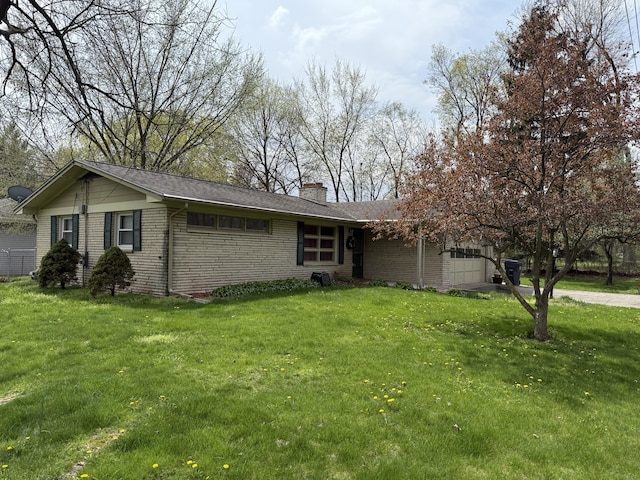 5346 E H Ave, Kalamazoo, MI 49048 - ranch-style home featuring a front yard, a chimney, and brick siding
