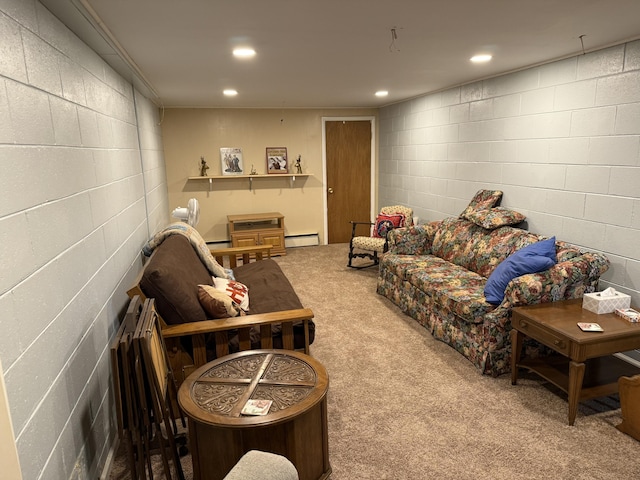5346 E H Ave, Kalamazoo, MI 49048 - living area with concrete block wall, recessed lighting, a baseboard heating unit, and carpet floors