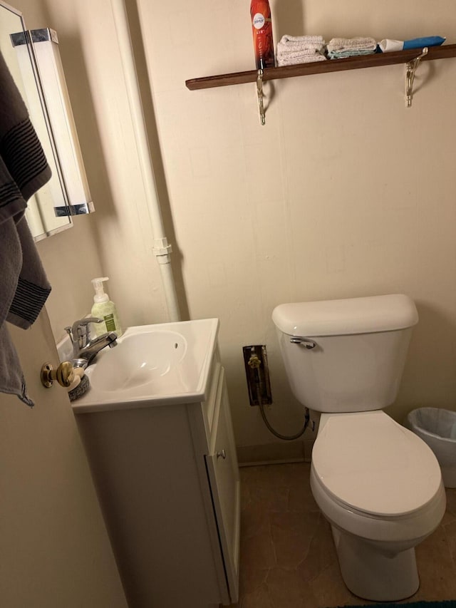 5346 E H Ave, Kalamazoo, MI 49048 - bathroom featuring toilet, tile patterned flooring, and vanity
