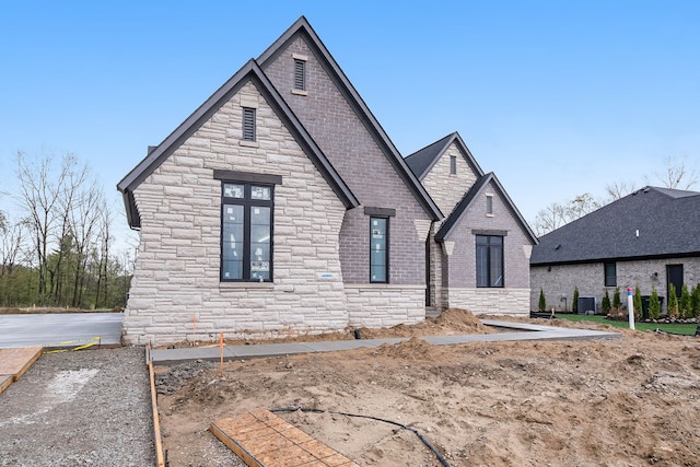 view of front of home with stone siding