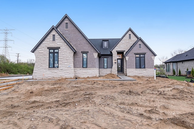 view of front of house with stone siding