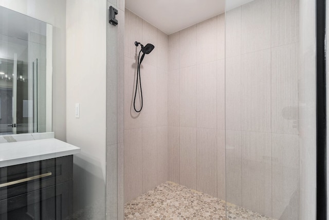 bathroom featuring a tile shower