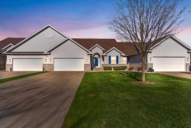12031 E Schonborn Pl N Unit 3, Clio, MI 48420 - ranch-style home featuring brick siding, a garage, a lawn, and driveway