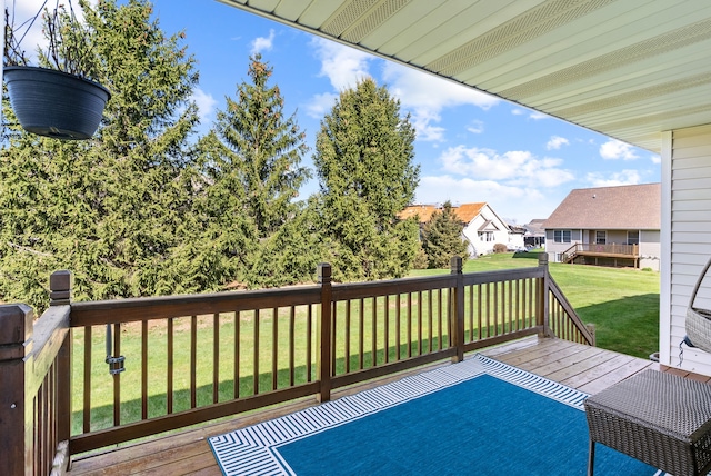 12031 E Schonborn Pl N Unit 3, Clio, MI 48420 - deck with a lawn and a residential view