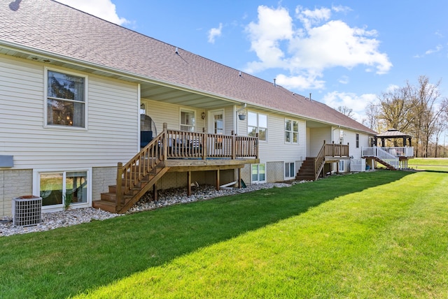 12031 E Schonborn Pl N Unit 3, Clio, MI 48420 - back of property featuring a lawn, a deck, central AC unit, stairway, and a gazebo