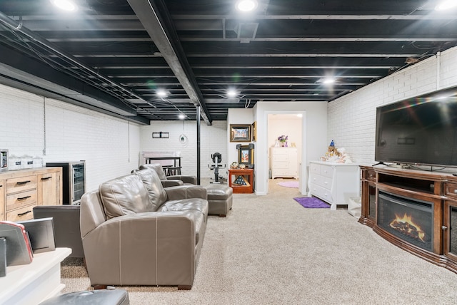 12031 E Schonborn Pl N Unit 3, Clio, MI 48420 - living room with a glass covered fireplace, carpet, and brick wall