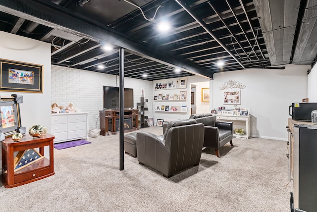 12031 E Schonborn Pl N Unit 3, Clio, MI 48420 - living room featuring carpet floors, baseboards, and brick wall