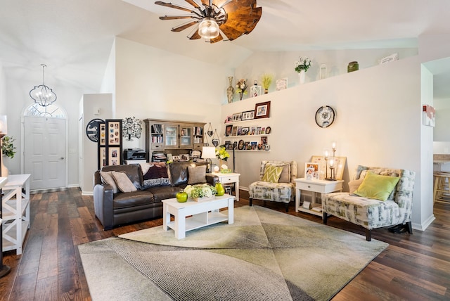 12031 E Schonborn Pl N Unit 3, Clio, MI 48420 - living room featuring baseboards, high vaulted ceiling, wood finished floors, and ceiling fan with notable chandelier
