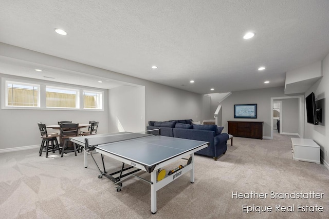 playroom featuring recessed lighting, light carpet, and baseboards