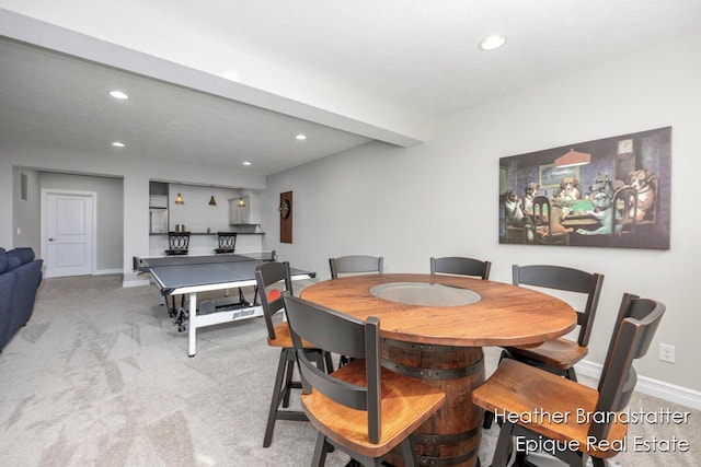 dining room with baseboards, recessed lighting, and carpet