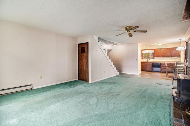unfurnished living room with baseboards, light carpet, ceiling fan, and stairs
