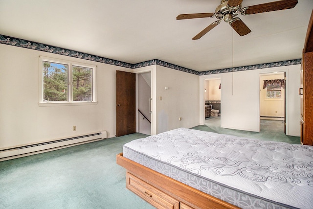 bedroom with a ceiling fan, baseboard heating, carpet floors, and ensuite bathroom