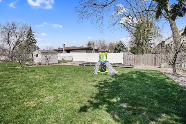 view of yard with a fenced backyard
