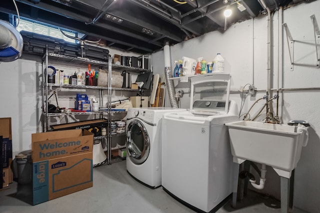 laundry room with washer and dryer and laundry area