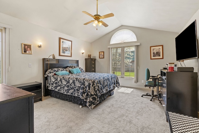 bedroom with a ceiling fan, carpet, and vaulted ceiling
