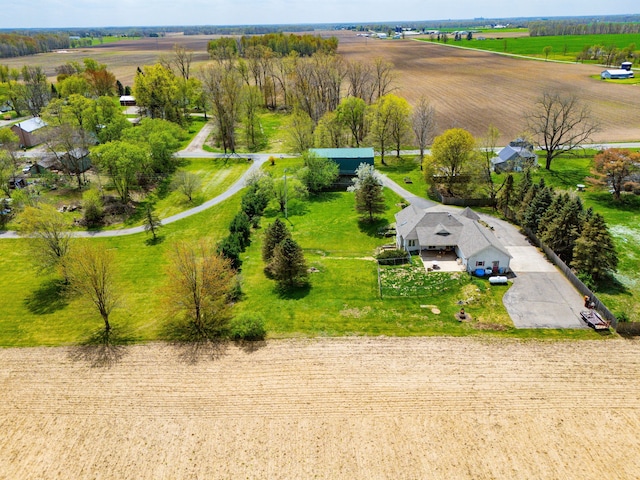 birds eye view of property featuring a rural view