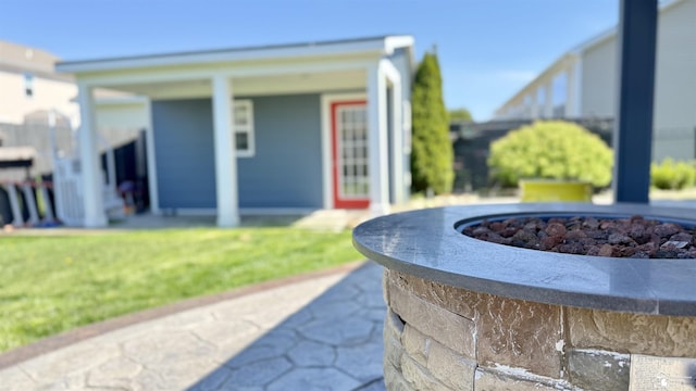 exterior space with an outdoor fire pit