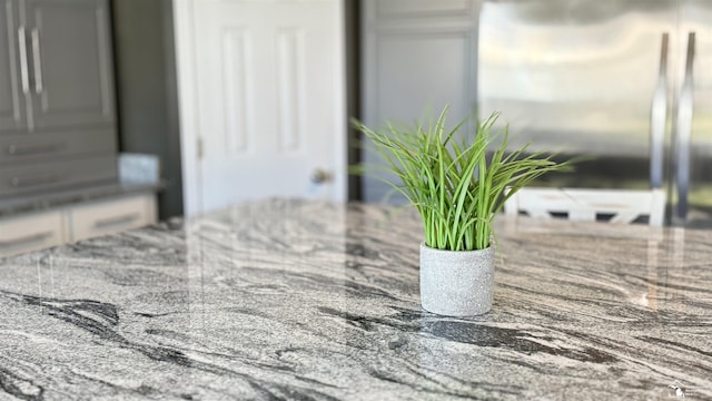 room details with stainless steel refrigerator