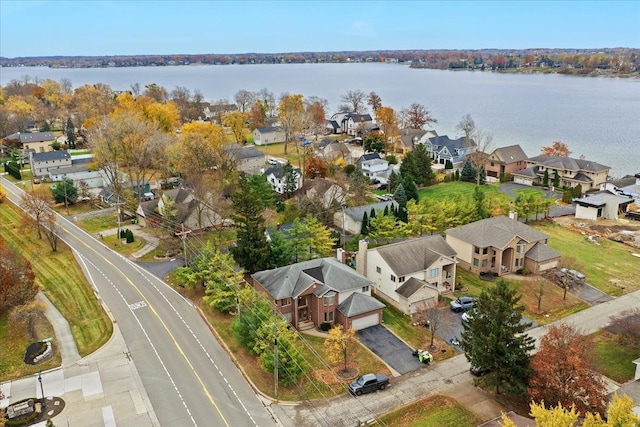 aerial view featuring a water view and a residential view