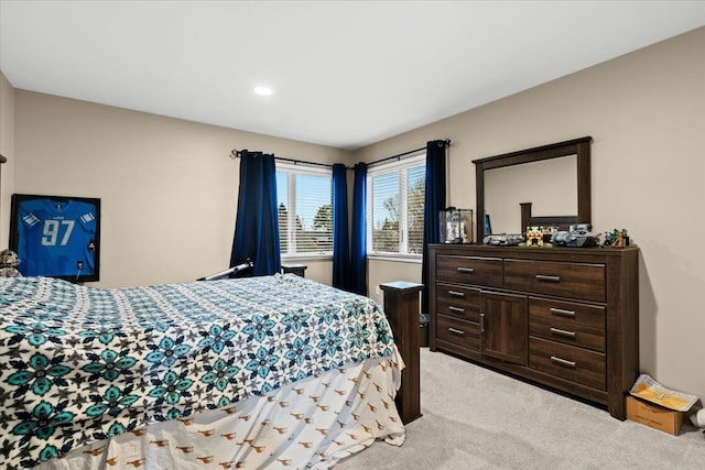 bedroom with light carpet