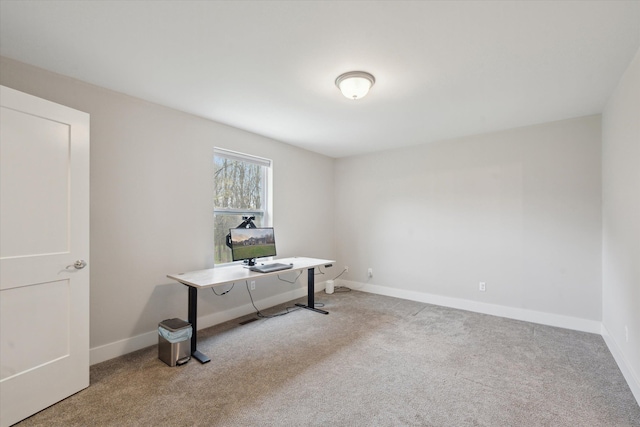 office featuring carpet floors and baseboards