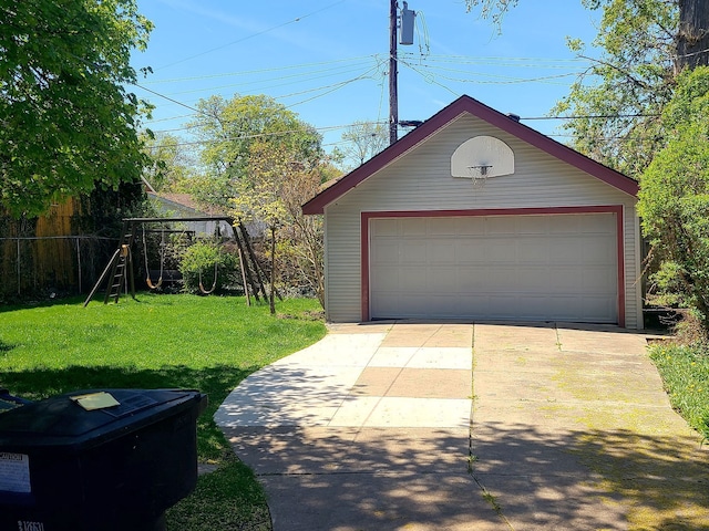 detached garage featuring fence
