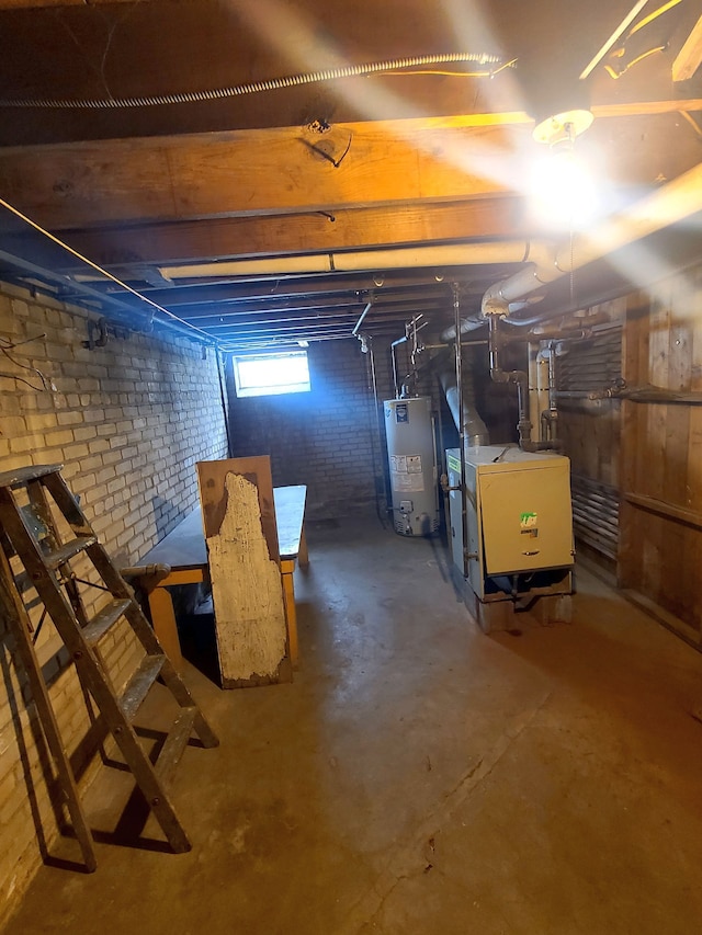 below grade area featuring water heater