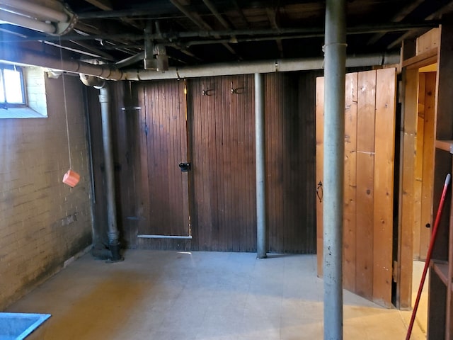 below grade area with tile patterned floors