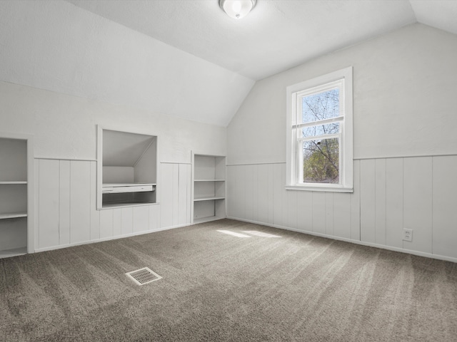 22625 Oaklane St, Warren, MI 48089 - additional living space featuring carpet, wainscoting, and lofted ceiling