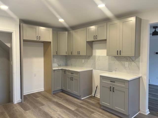 17639 Lenore, Detroit, MI 48219 - kitchen with gray cabinetry, decorative backsplash, and dark wood-type flooring