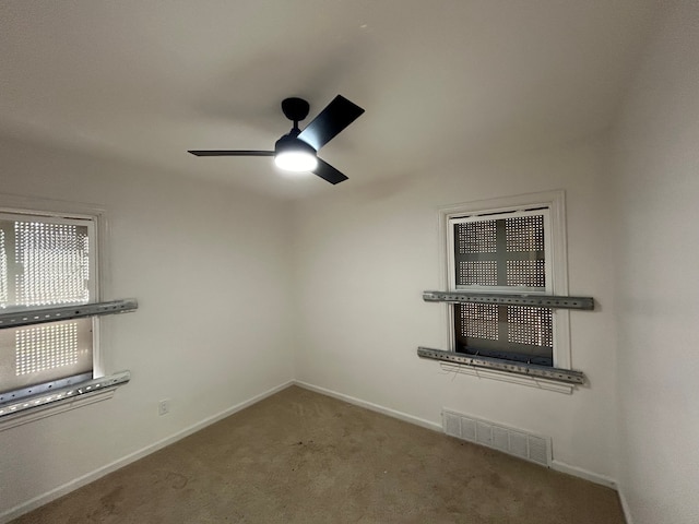 17639 Lenore, Detroit, MI 48219 - spare room with baseboards, a ceiling fan, carpet flooring, and visible vents