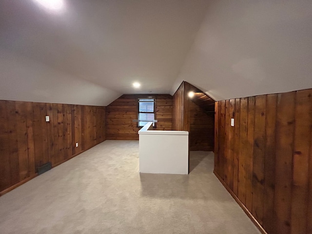 17639 Lenore, Detroit, MI 48219 - additional living space with light colored carpet, wood walls, and vaulted ceiling