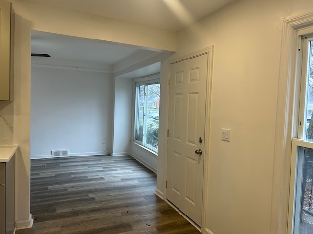 17639 Lenore, Detroit, MI 48219 - interior space featuring visible vents, baseboards, and dark wood-type flooring