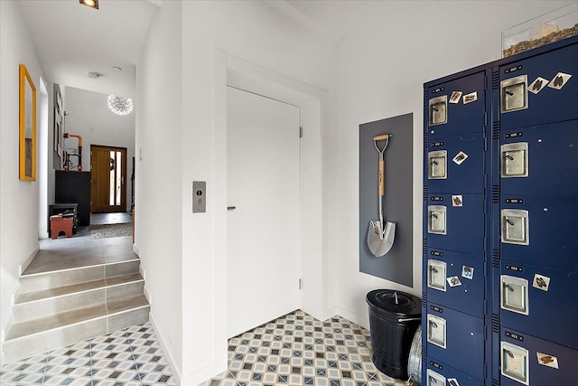 interior space with baseboards and heating unit