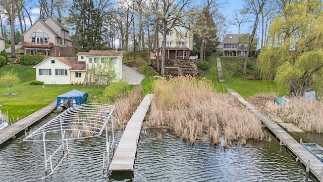 5027 Grover Dr, Brighton, MI 48116 - dock area with a yard and a water view