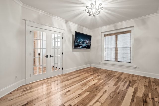 5027 Grover Dr, Brighton, MI 48116 - unfurnished room with baseboards, ornamental molding, french doors, and wood finished floors