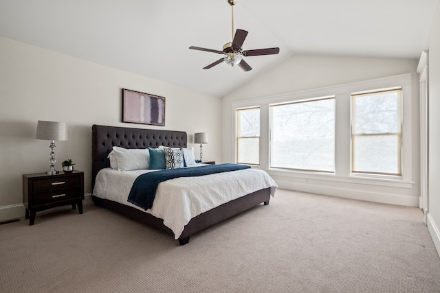 5027 Grover Dr, Brighton, MI 48116 - bedroom featuring vaulted ceiling, ceiling fan, light carpet, and baseboards