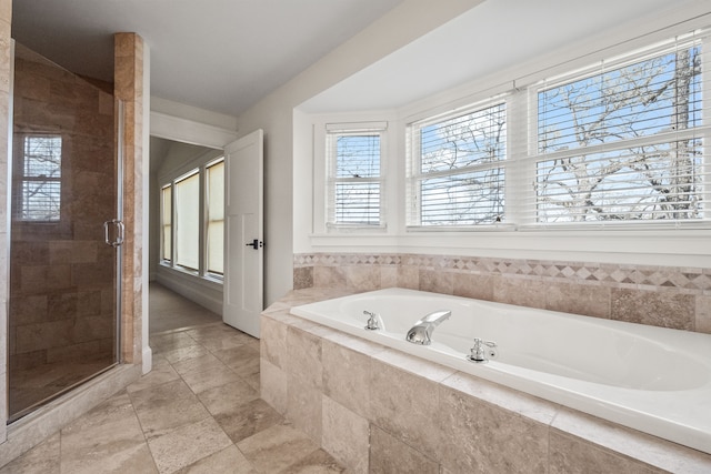 5027 Grover Dr, Brighton, MI 48116 - bathroom featuring a shower stall and a garden tub