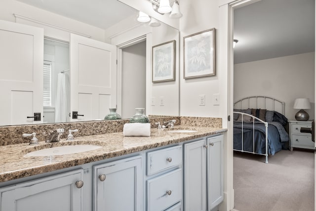 5027 Grover Dr, Brighton, MI 48116 - bathroom with ensuite bath, double vanity, and a sink