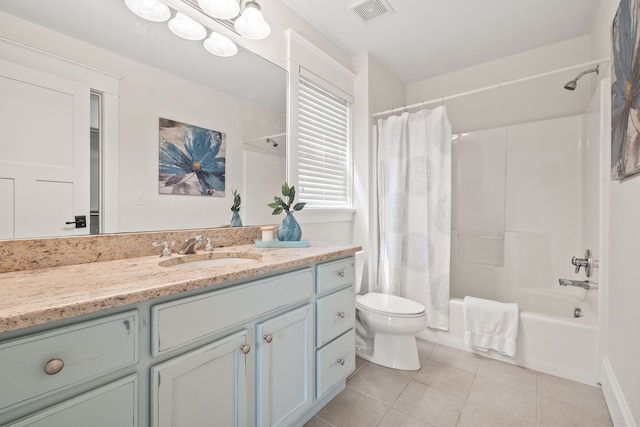 5027 Grover Dr, Brighton, MI 48116 - full bathroom featuring toilet, shower / bath combo, tile patterned floors, visible vents, and vanity