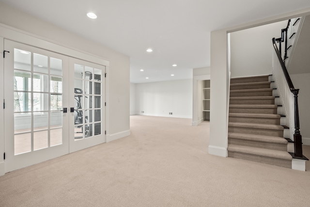 5027 Grover Dr, Brighton, MI 48116 - interior space with carpet flooring, french doors, stairway, baseboards, and recessed lighting