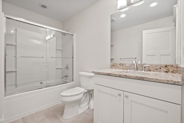 5027 Grover Dr, Brighton, MI 48116 - bathroom featuring toilet, combined bath / shower with glass door, tile patterned flooring, vanity, and recessed lighting
