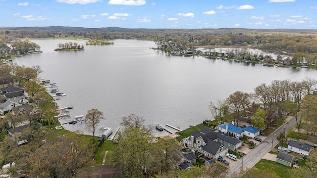 5027 Grover Dr, Brighton, MI 48116 - aerial view featuring a water view and a residential view