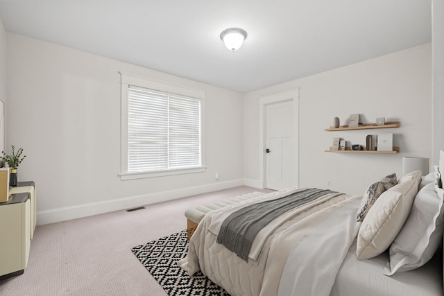 5027 Grover Dr, Brighton, MI 48116 - bedroom featuring carpet flooring, baseboards, and visible vents